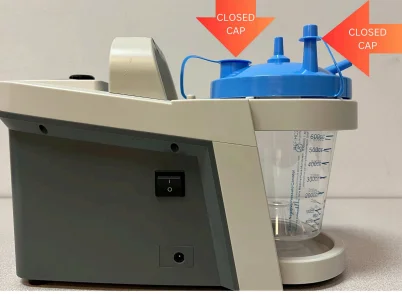 Suction machine with canister